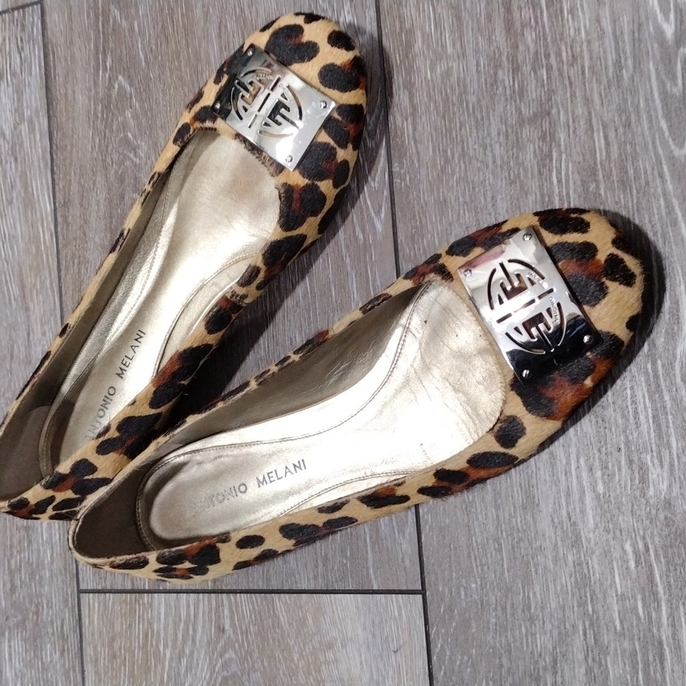 Antonio Melani womens leopard print cowhide orange and brown flats. Size 9.5